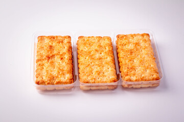 Three biscuits on a white background