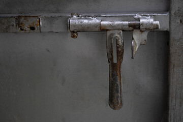 Close-up. Door latch made of steel.