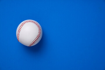 baseball on blue table background, sport concept