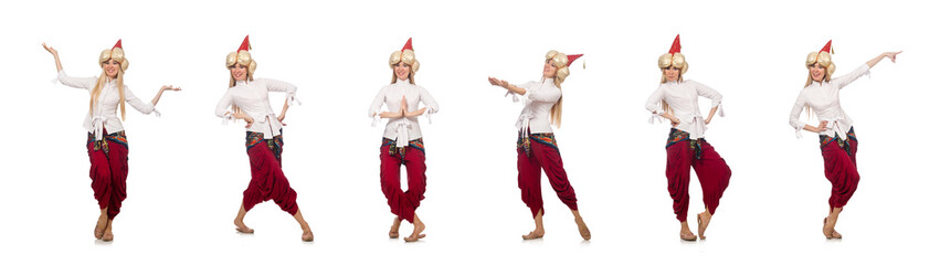 Young female magician isolated on white