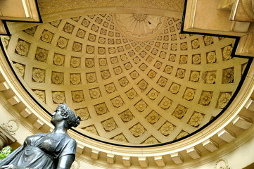 The dome of the pavilion and the statue of the Empress. Saint-Petersburg.