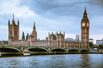 Big Ben, Houses of Parliament and Westminster bridge on Thames river. London, UK 