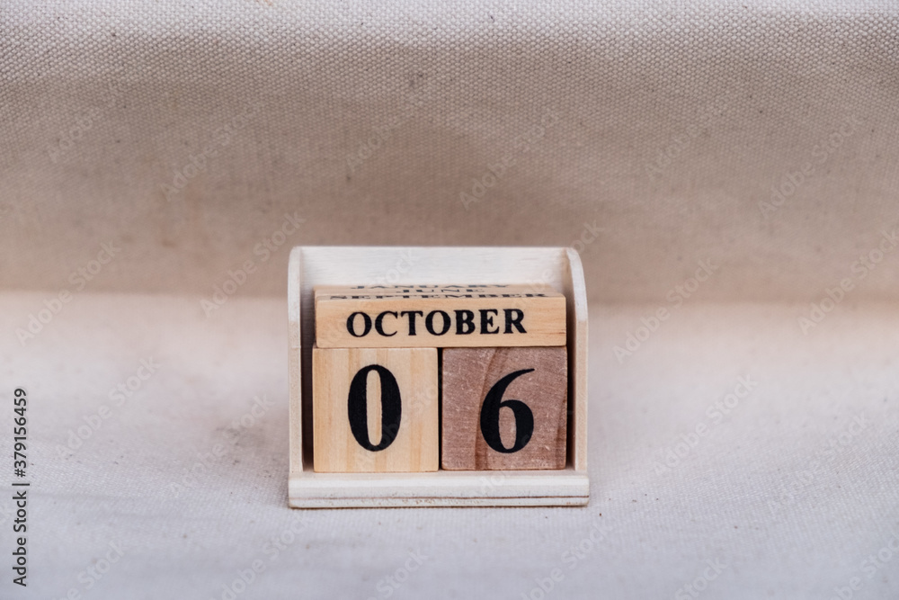 Fototapete october 6th. image of october 6 wooden color calendar on white canvas background. empty space for te