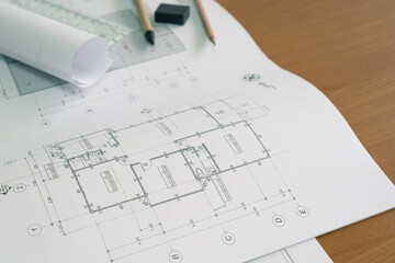 Top view on the plan of Architectural project, blueprints and Engineering tools. Construction concept.