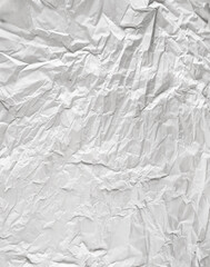 white sheet of paper battered with texture