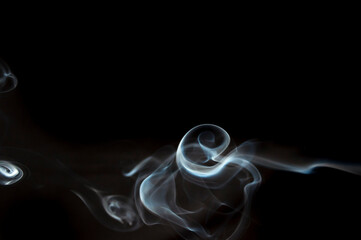 blue-white clouds of smoke