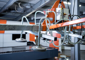 Suction cups equipment for transporting large sheets of metal