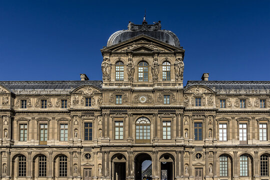 Architectural Fragments Of Square Court (Cour Carree) - One Of Main Courtyards Of Louvre Palace In Paris. Museum Is One Of Largest And Most Visited Museums Worldwide. PARIS, FRANCE. April 23, 2015.