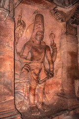 badami cave sculptures of hindu gods carved on walls ancient stone art in details