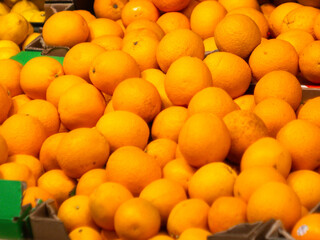 oranges on the store counter. fresh fruit.