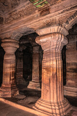 badami cave temple interior pillars stone art in details