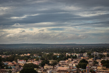 city view from hill top at morning with bright sky