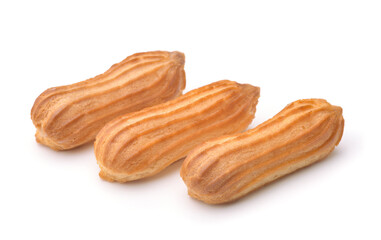 Three fresh baked eclairs isolated on white