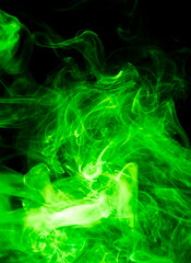 Green smoke on black background