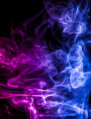 Obraz premium Colored smoke on black background