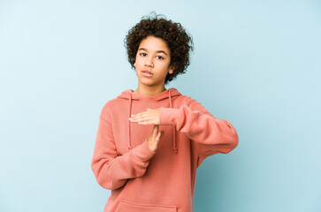 African american little boy isolated showing a timeout gesture.