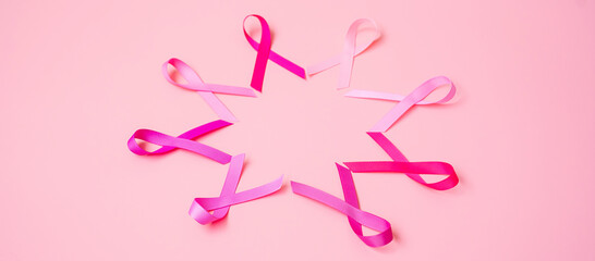 October Breast Cancer Awareness month, Pink Ribbon on pink background for supporting people living and illness. International Women, Mother and World cancer day concept