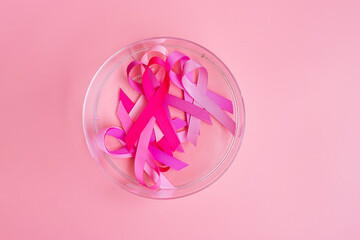 October Breast Cancer Awareness month, Pink Ribbon on pink background for supporting people living and illness. International Women, Mother and World cancer day concept