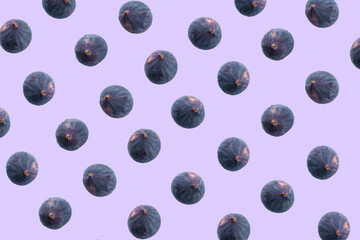 pattern of fresh figs on a pink pastel background