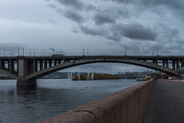 The communal bridge connects the two banks of the city of Krasnoyarsk, as well as Western and Eastern Siberia