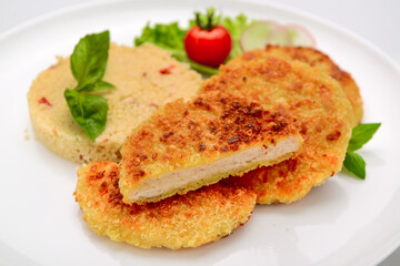 Chicken cutlet in batter with bulgur. Healthy food