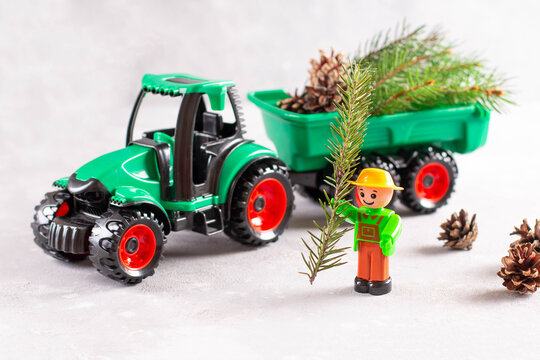 Christmas tree on the green tractor, christmas travel holiday concept.