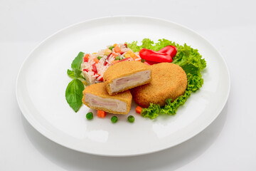 Chicken meatballs in batter with ham and risotto