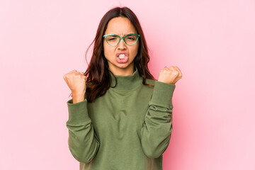 Young mixed race hispanic woman isolated showing fist to camera, aggressive facial expression.