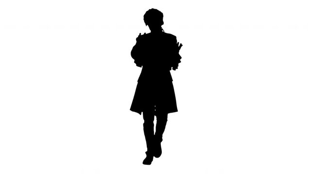Silhouette Man dressed as courtier talking expressively and waiving his hands while walking and looking at camera.