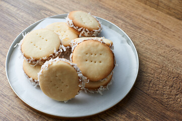 Alfajores: Traditional Peruvian cookies filled with caramelized milk and shredded coconut.
