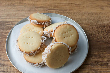 Alfajores: Traditional Peruvian cookies filled with caramelized milk and shredded coconut.
