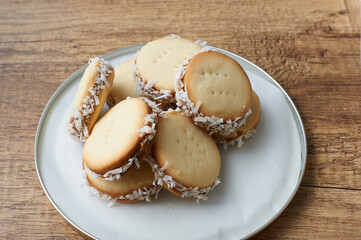 Alfajores: Traditional Peruvian cookies filled with caramelized milk and shredded coconut.
