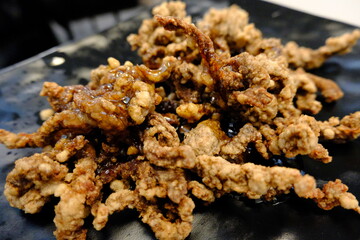 Ternera crujiente con salsa de naranja