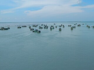 Naklejka premium Group of boats(flotilla) in the silent sea
