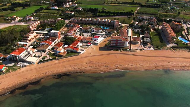 Aerial view of the beach and the city Almadrava beside Denia in Spain on a sunny day in spring.