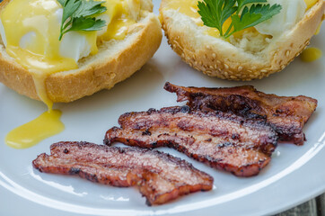 Homemade Benedict Eggs on the plate with souce