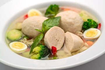 Hot chicken soup with vegetables,, broth with meatballs