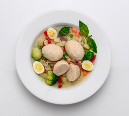 Hot chicken soup with vegetables,, broth with meatballs