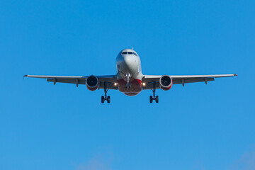 Pulkovo airport near Saint Petersburg/ Russia - September 19 2020: Airplane of rossiya company with chassis from the front landing or taking off. Inscription means Russia in Russian