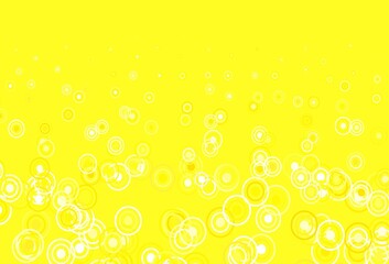 Light Yellow vector background with spots.