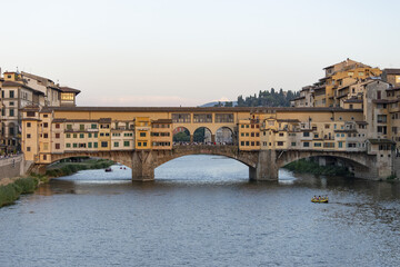 Fototapeta na wymiar Ponte Vecchio in Florence over the Arno river and Vasari Corridor
