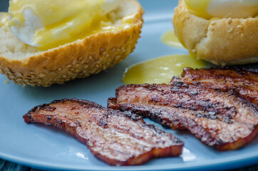 Homemade Benedict Eggs on the plate with souce