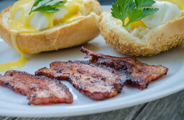 Homemade Benedict Eggs on the plate with souce