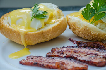 Homemade Benedict Eggs on the plate with souce