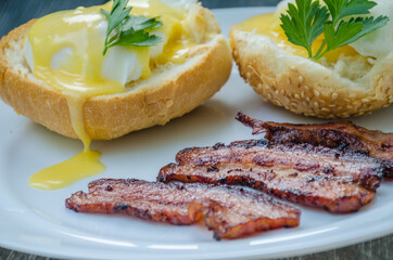 Homemade Benedict Eggs on the plate with souce