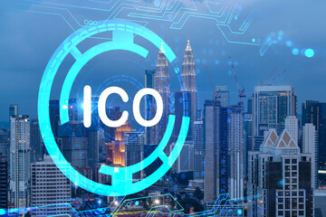 Initial coin offering hologram, night panorama city view of Kuala Lumpur. KL is the center of cryptocurrency projects in Malaysia, Asia. The concept of widespread ICO hysteria. Double exposure.