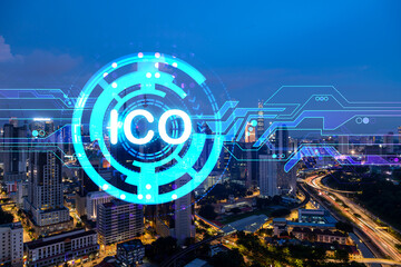 Initial coin offering hologram, night panorama city view of Kuala Lumpur. KL is the center of cryptocurrency projects in Malaysia, Asia. The concept of widespread ICO hysteria. Double exposure.