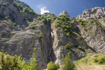 Tzoumerka national park mountains and a waterfall Kefalovriso - higherst waterfall in Greece with 350m