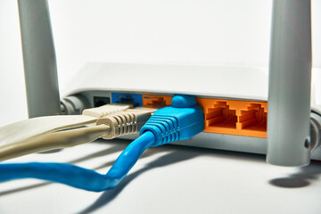 Connecting to a router, network cables connected to a router.