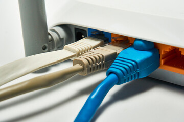 Connecting to a router, network cables connected to a router.